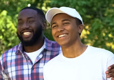 father supporting teen son with advice new chapter