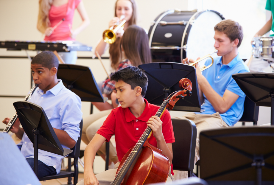 children playing musical instruments at music club